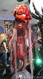 Huge red skeleton bride sculpture in the art gallery