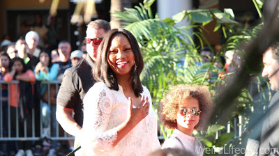 Garcelle Beauvais smiling at the fans